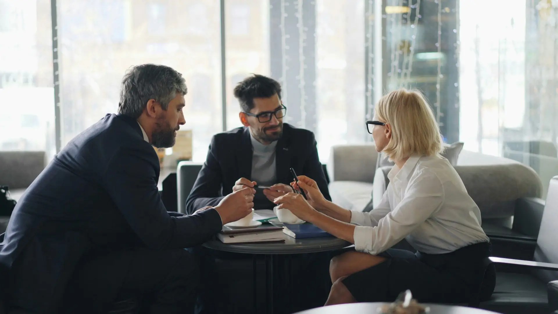 A person consulting with an attorney about a vehicle collision claim