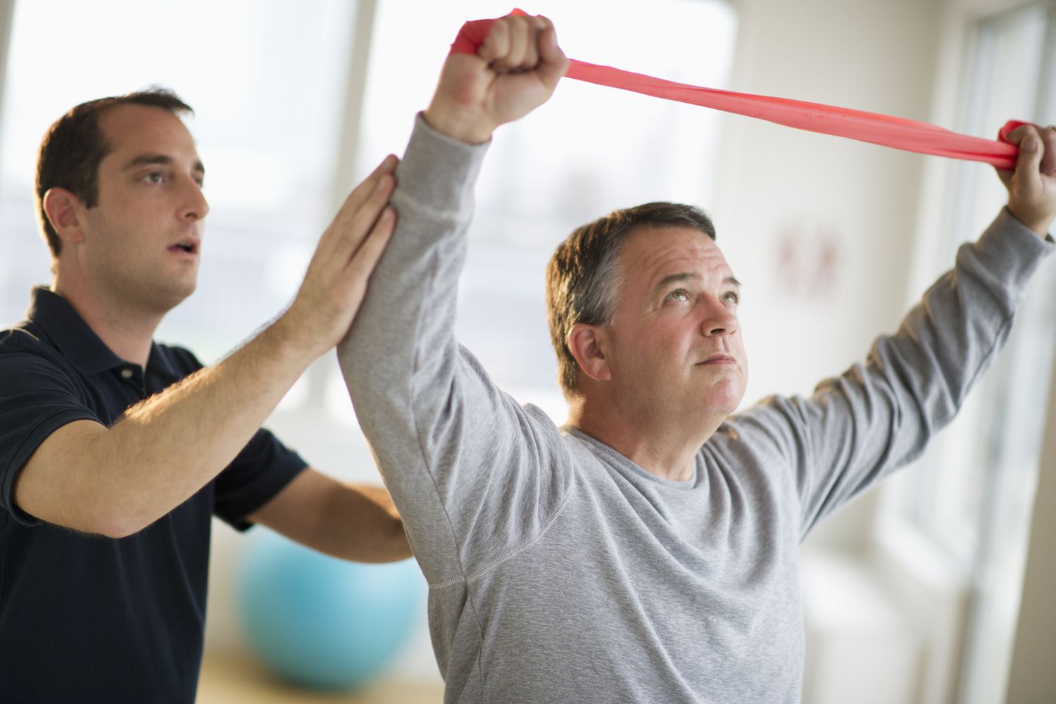A person working through physical rehabilitation after a roadway collision