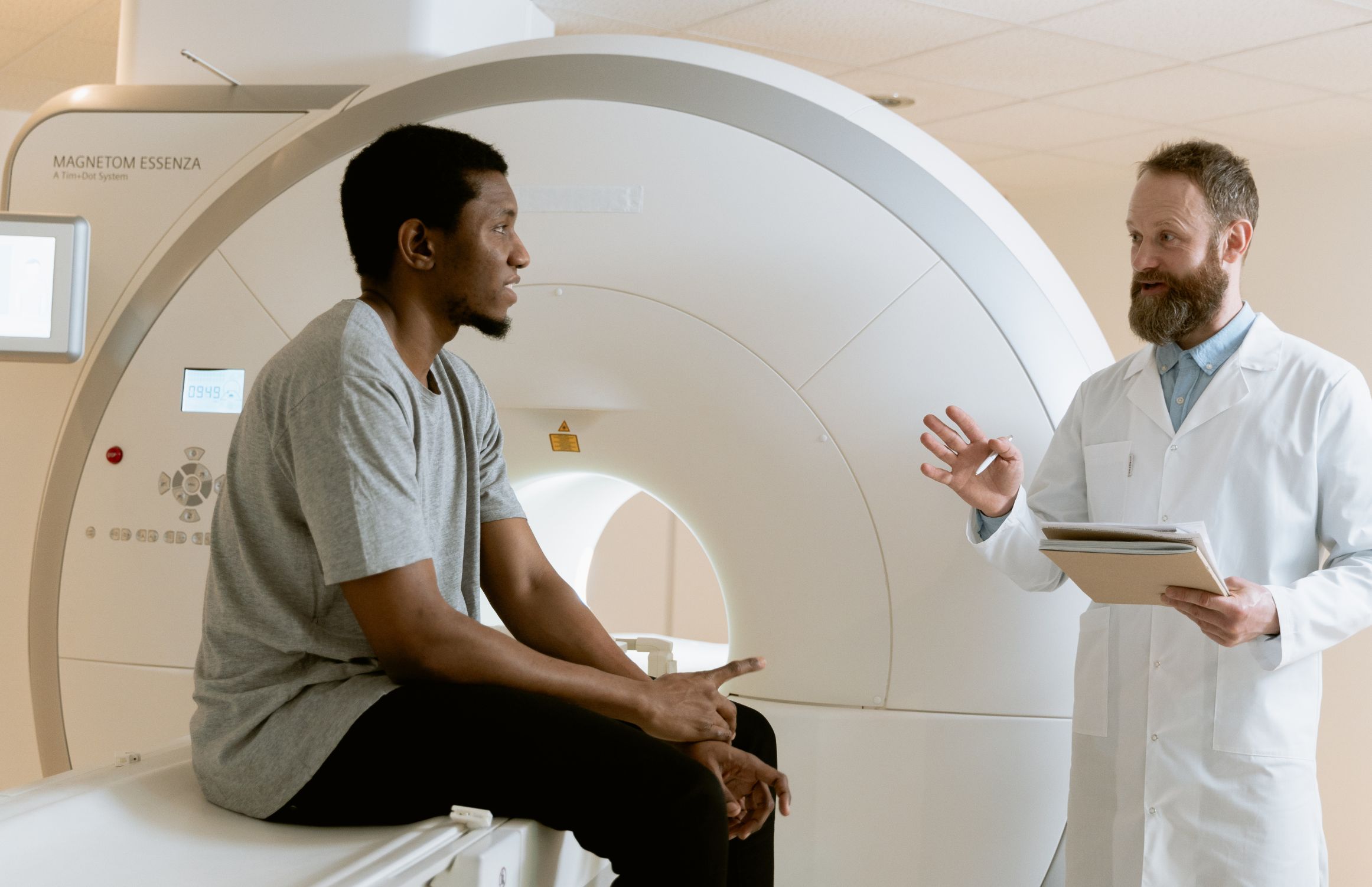 A clinician reviewing a brain scan after a vehicle wreck